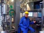 Dr. Lange at the Norway fish oil factory, tweaking his formula.